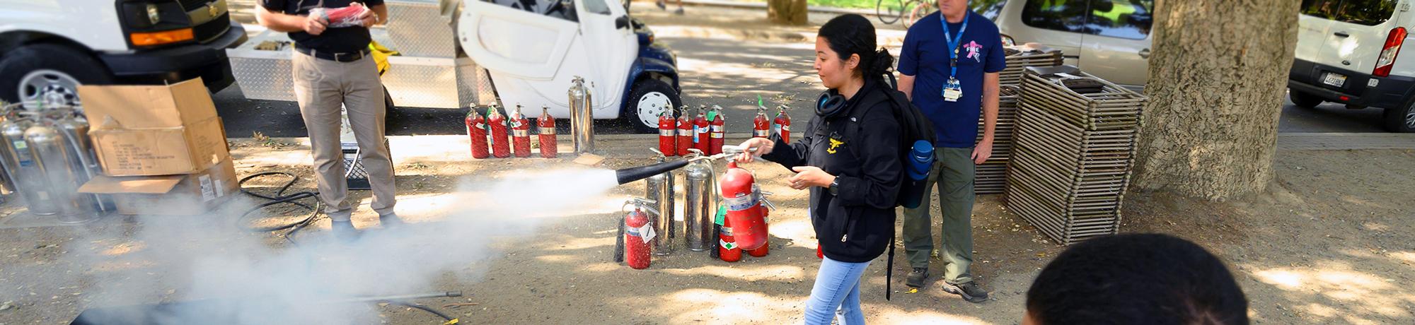 Photo of fire extinguisher training.